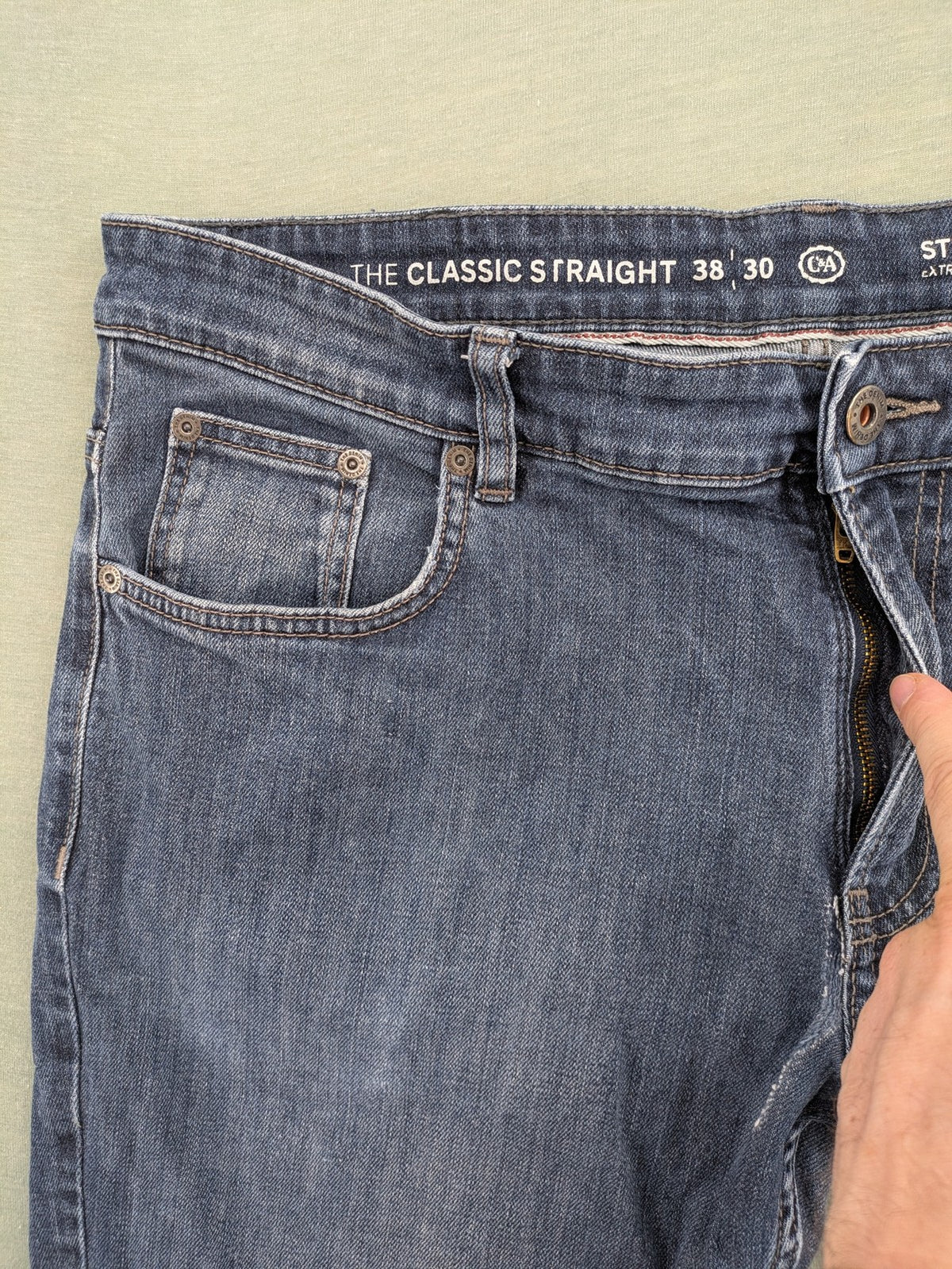 C&A blue straight jeans with classic 5-pocket design and stretch denim material.