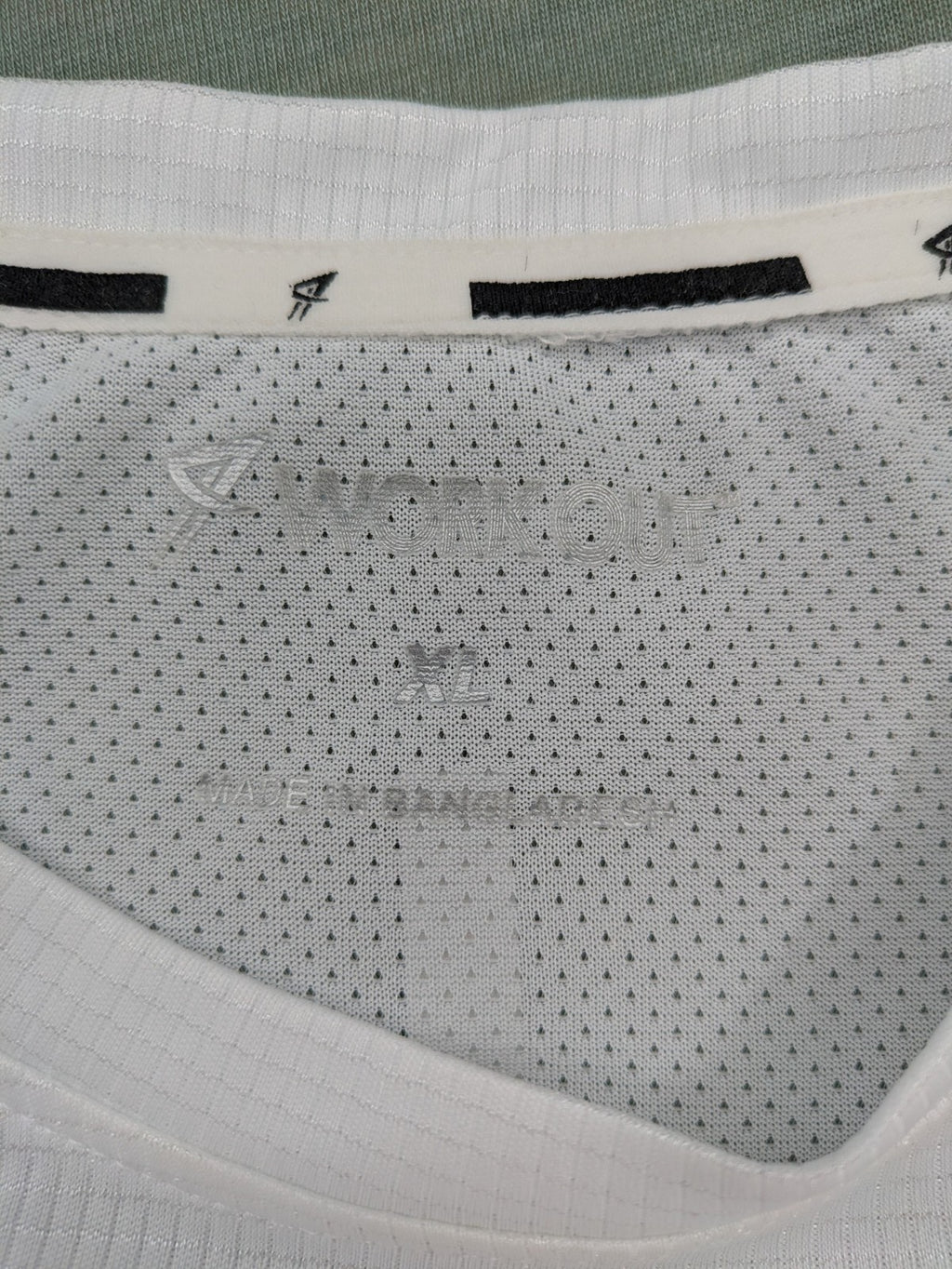 Smilodox white workout t-shirt with logo on chest and reflective detail on back.
