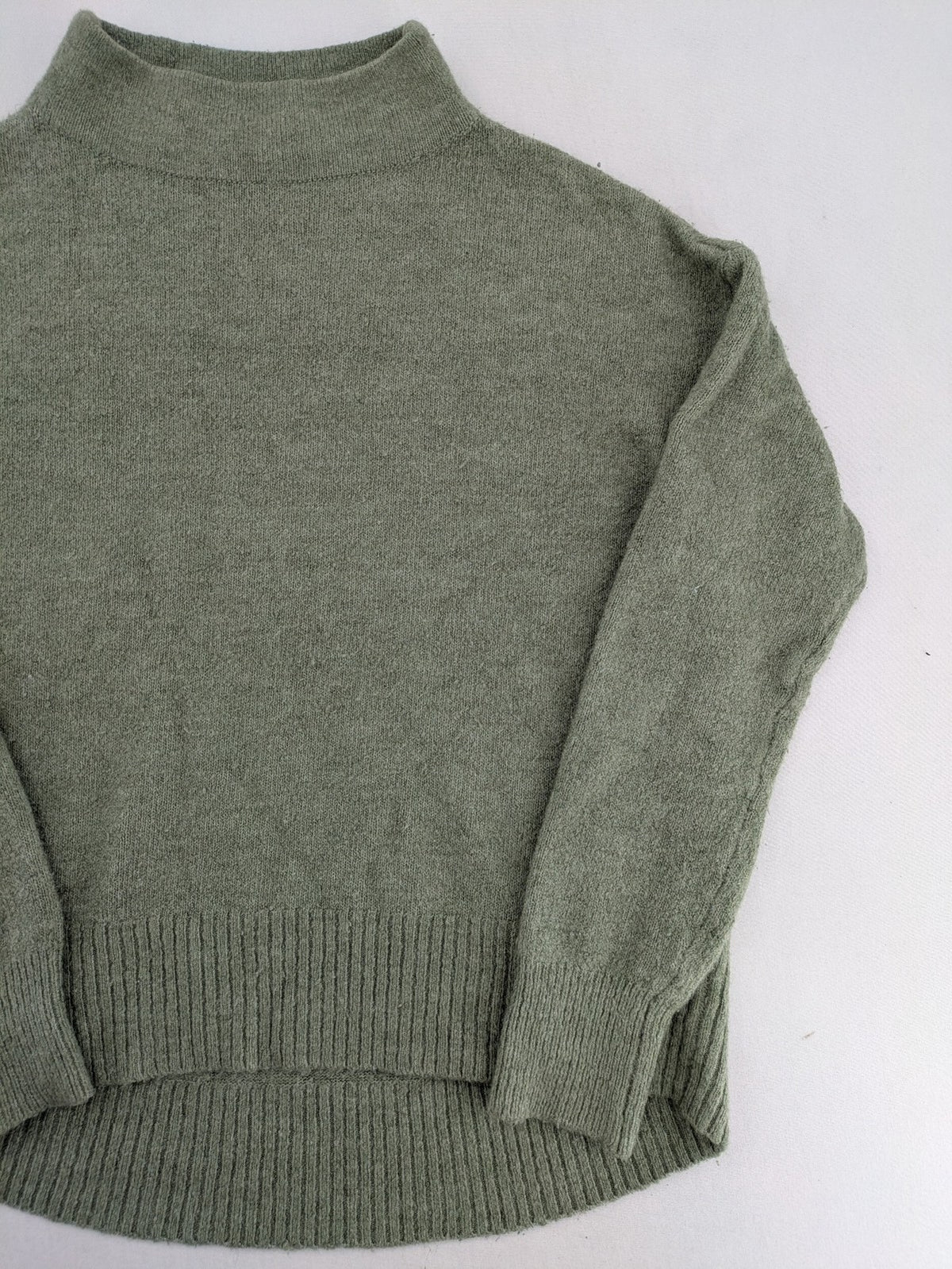 up2 fashion green turtle neck jumper soft knit high-low hem with side slits