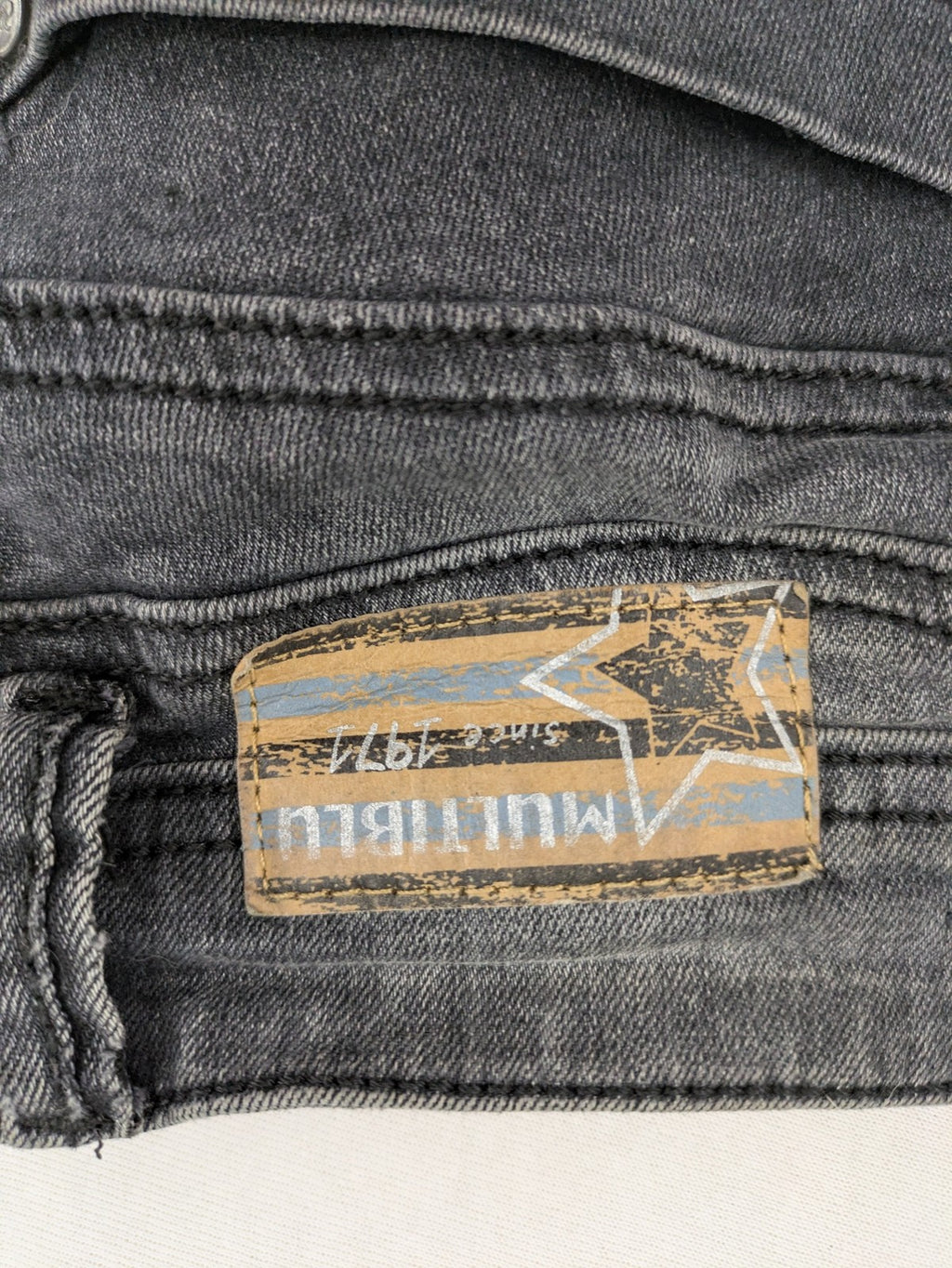multiblu grey skinny jeans faded wash five-pocket design with button closure