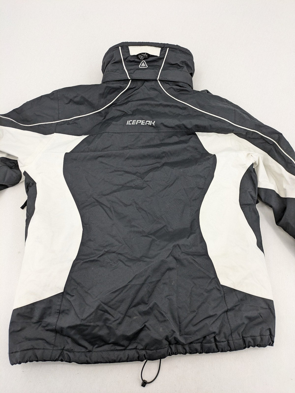 Icepeak black and white ski snowboard jacket with RECCO logo and quilted insulation.