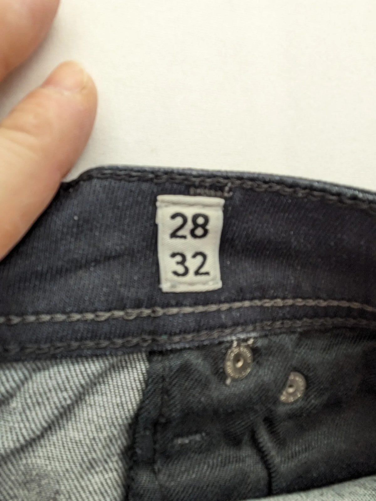 Jack & Jones grey slim fit jeans with classic 5-pocket style and button closure.