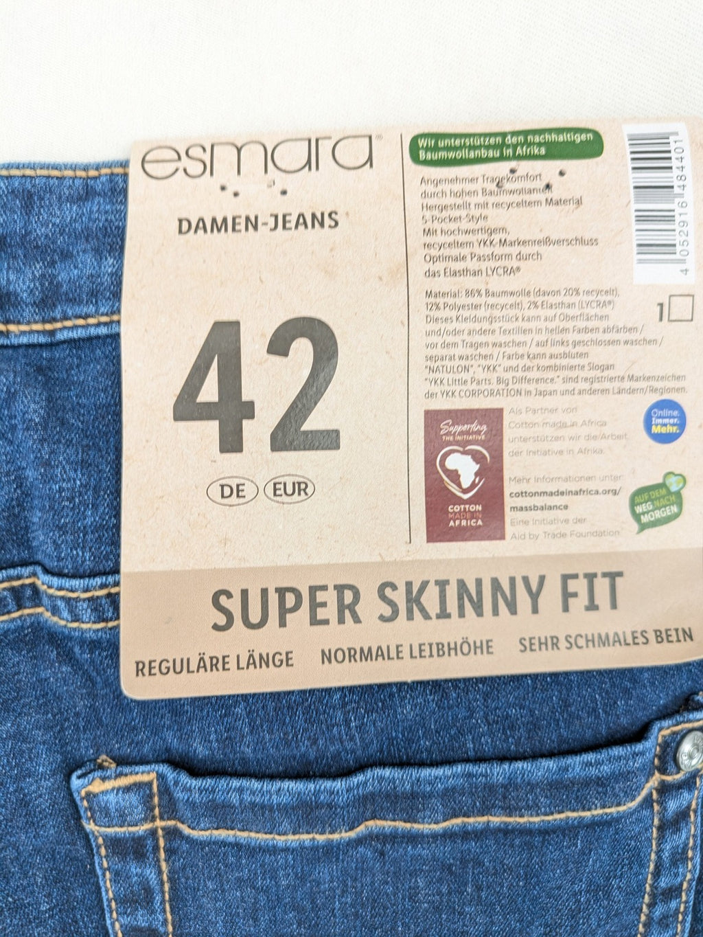 ESMARA blue super skinny jeans with dark wash and stretch denim material.