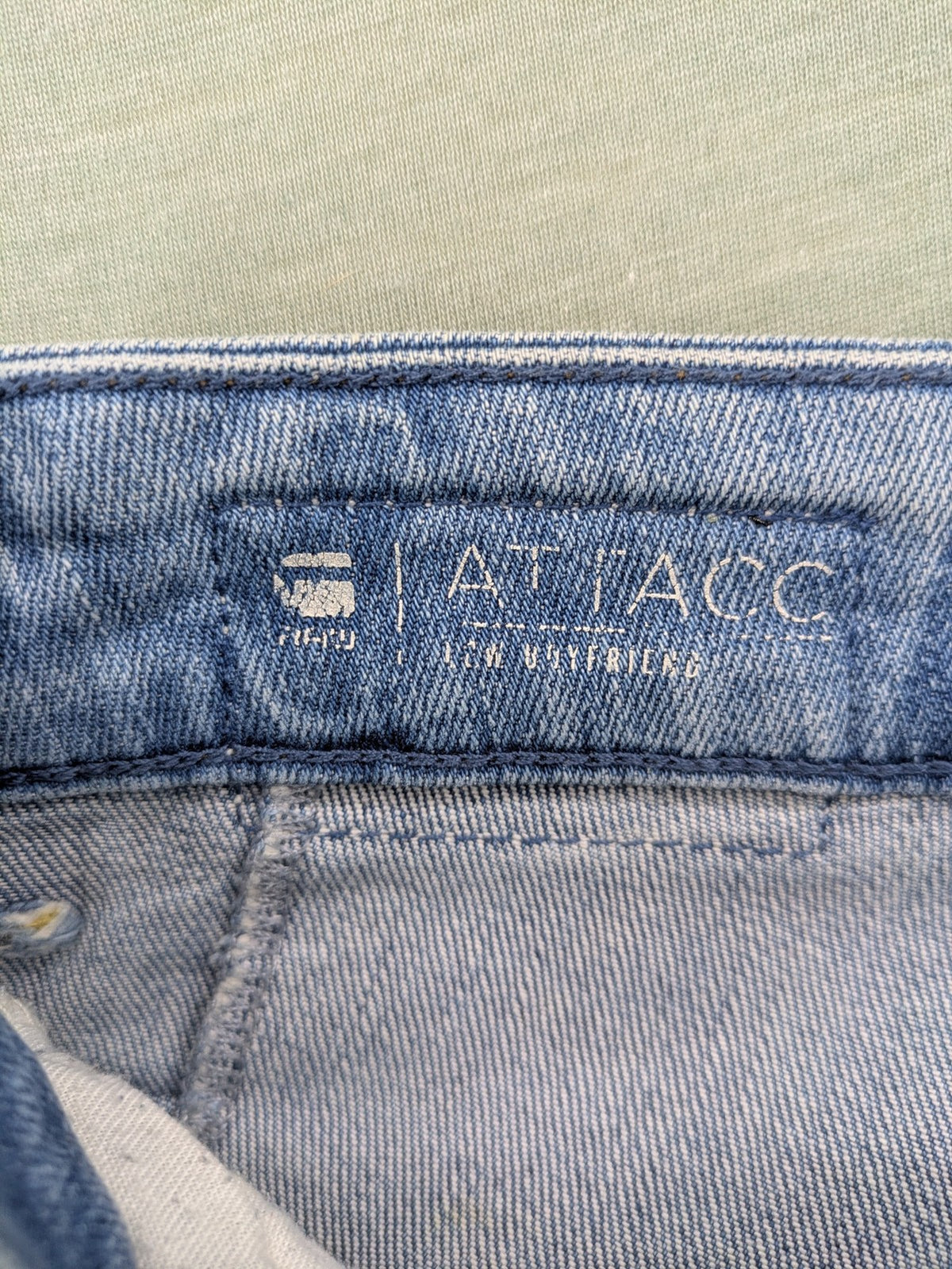 G-Star Raw blue slim skinny jeans with light wash and signature back zip pocket.