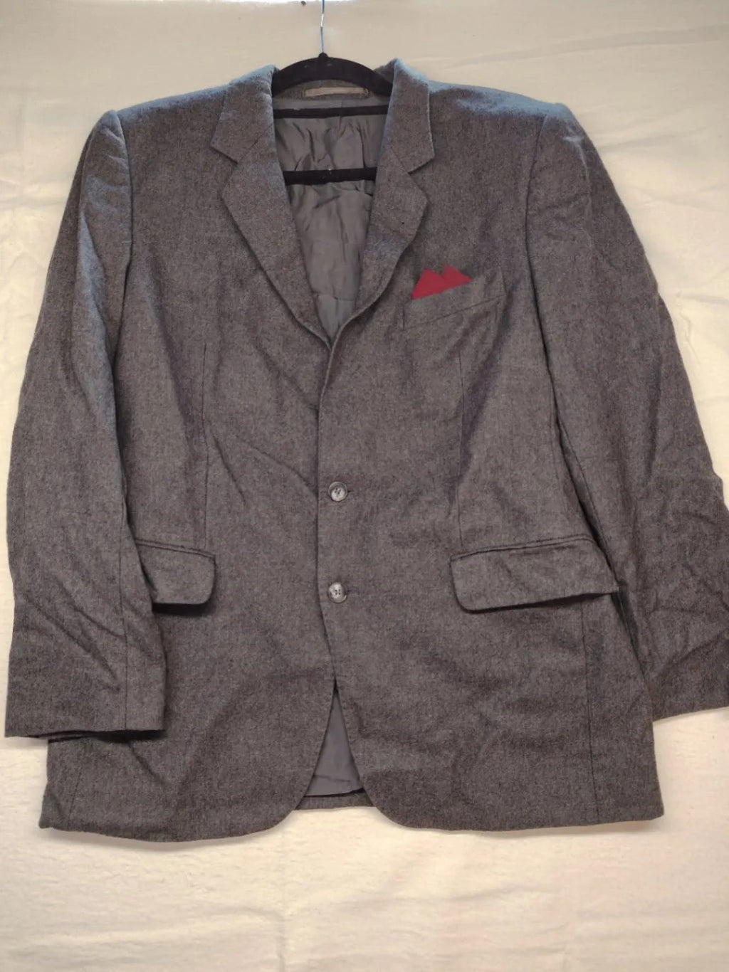 Adler pink two-piece suit, classic two-button design, luxurious wool-cashmere blend.