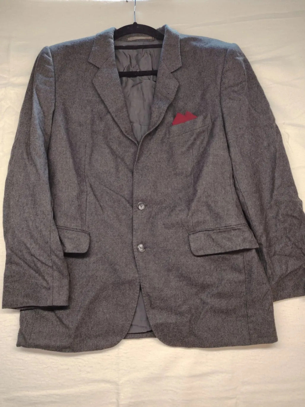 Adler pink two-piece suit, classic two-button design, luxurious wool-cashmere blend.
