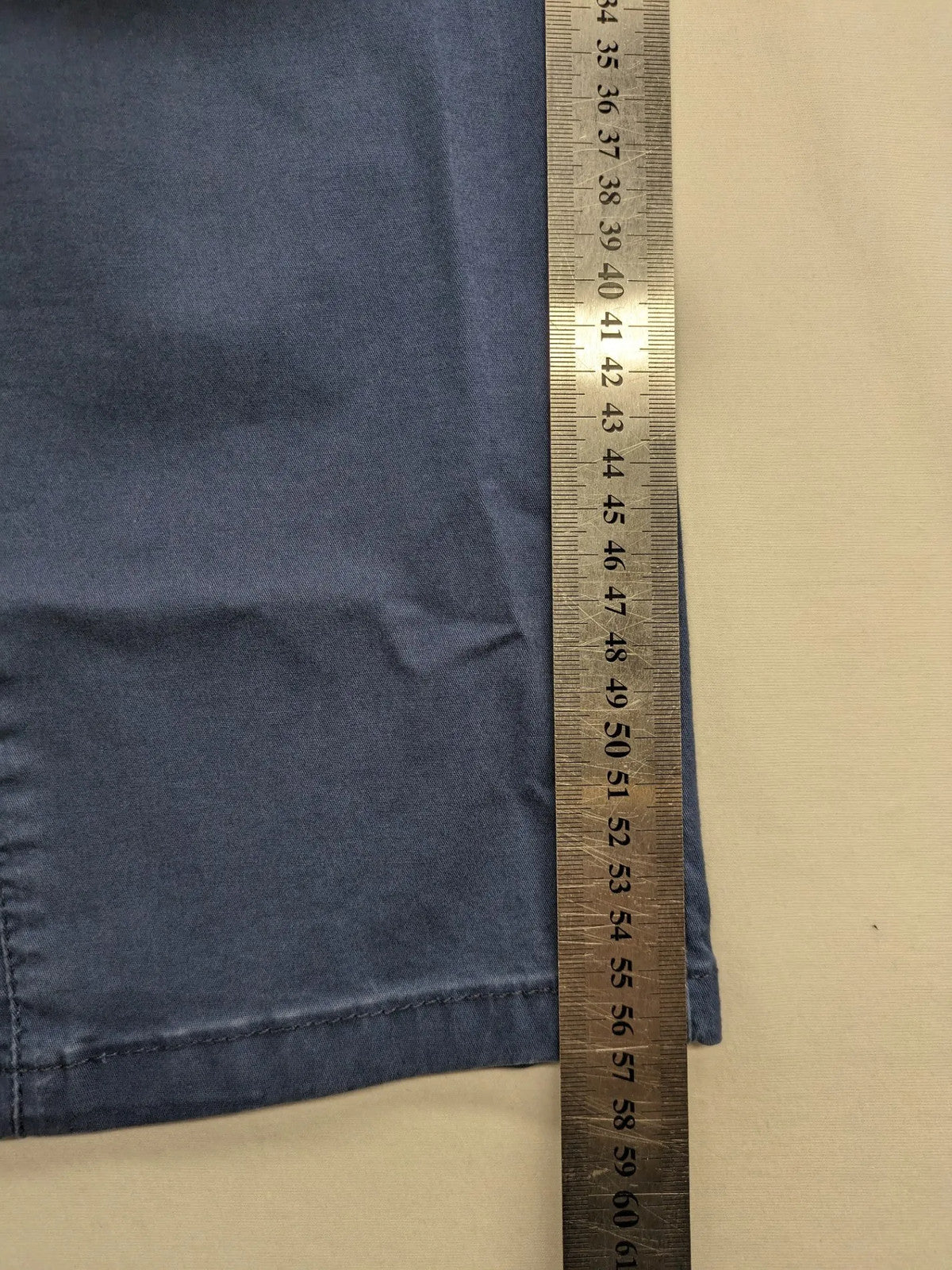 Angels blue straight jeans with five-pocket design and vertical front seams.