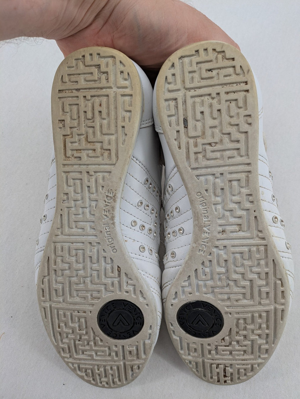 Venice low-top sneakers beige and white with rhinestone embellishments and unique sole pattern.