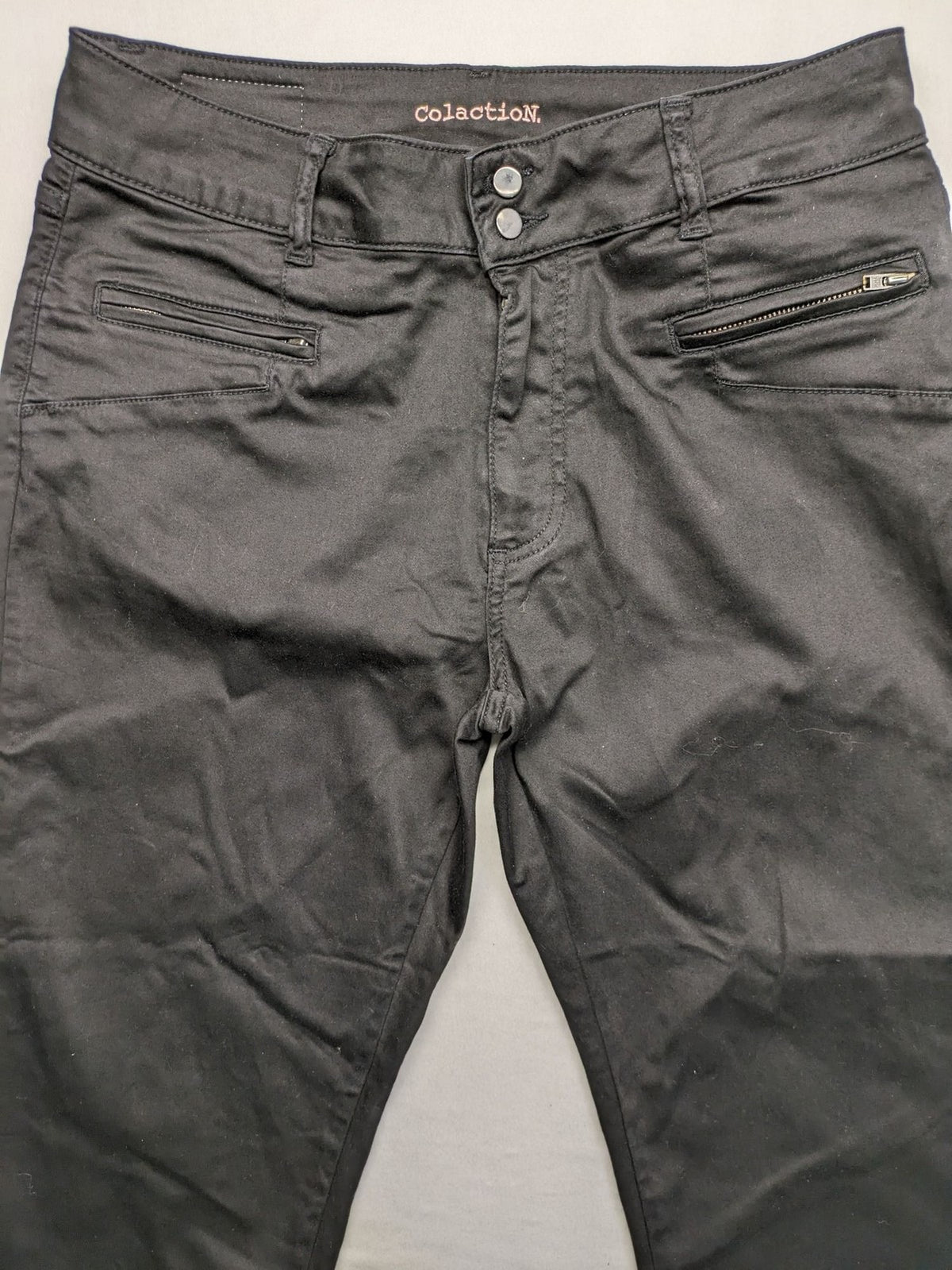 Colac black straight jeans high waist with double button, zipper pockets, and stretch material.