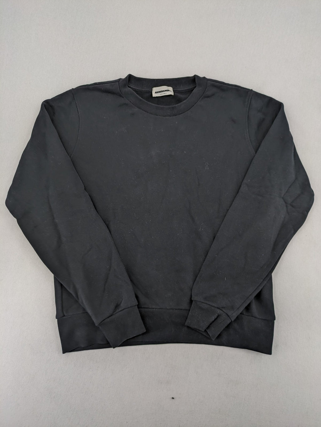 Armedangels black turtle neck jumper with embroidered logo, made from 100% organic cotton.