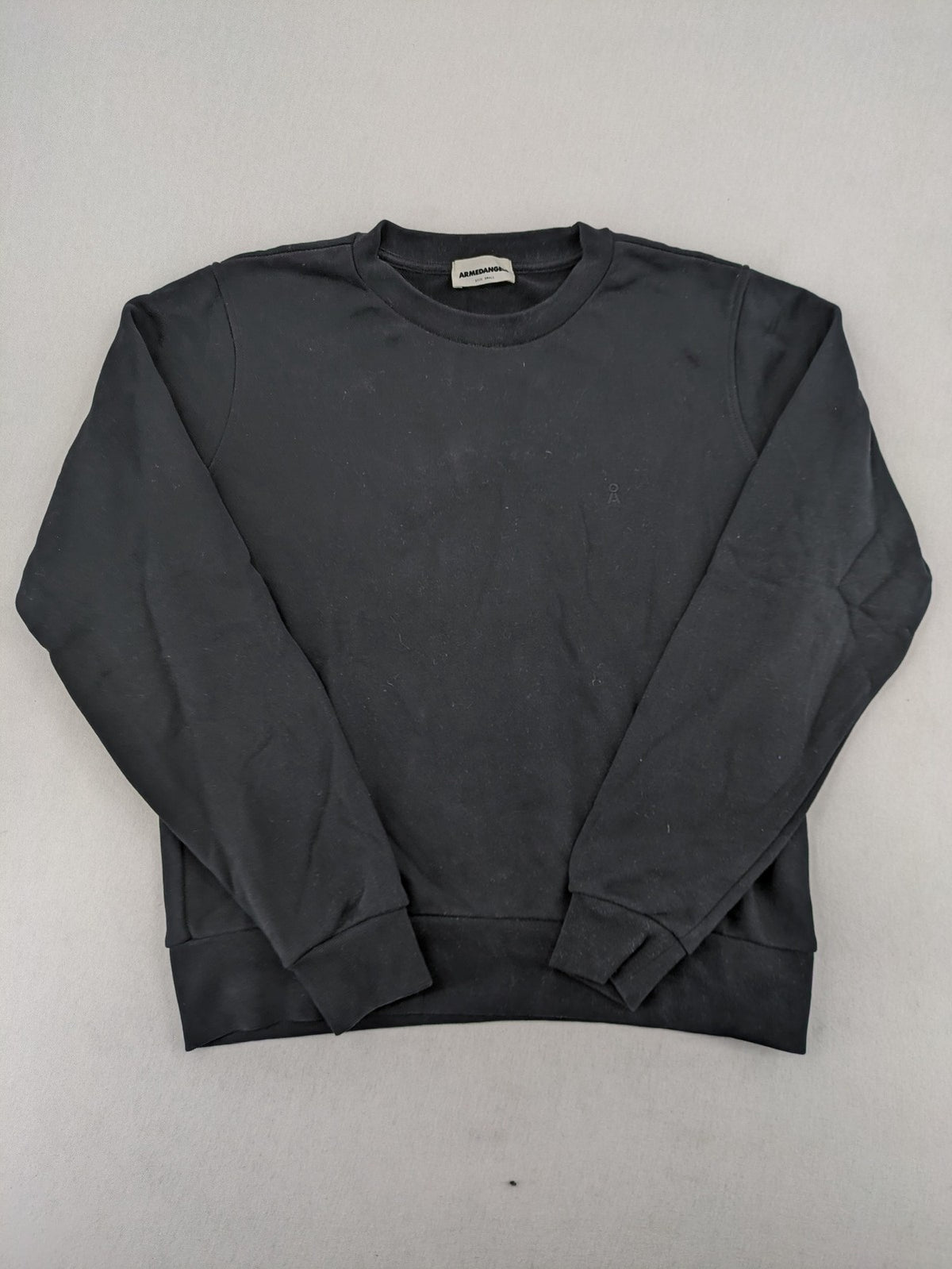 Armedangels black turtle neck jumper with embroidered logo, made from 100% organic cotton.