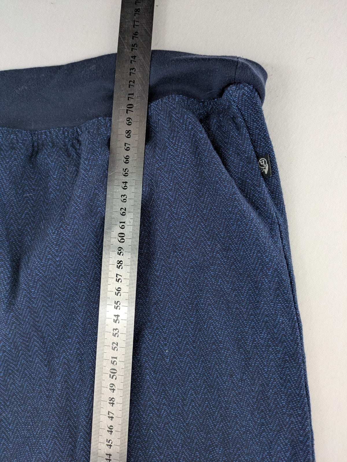 Hajo navy turtle neck jumper with herringbone pattern, zip collar, and chest pocket.