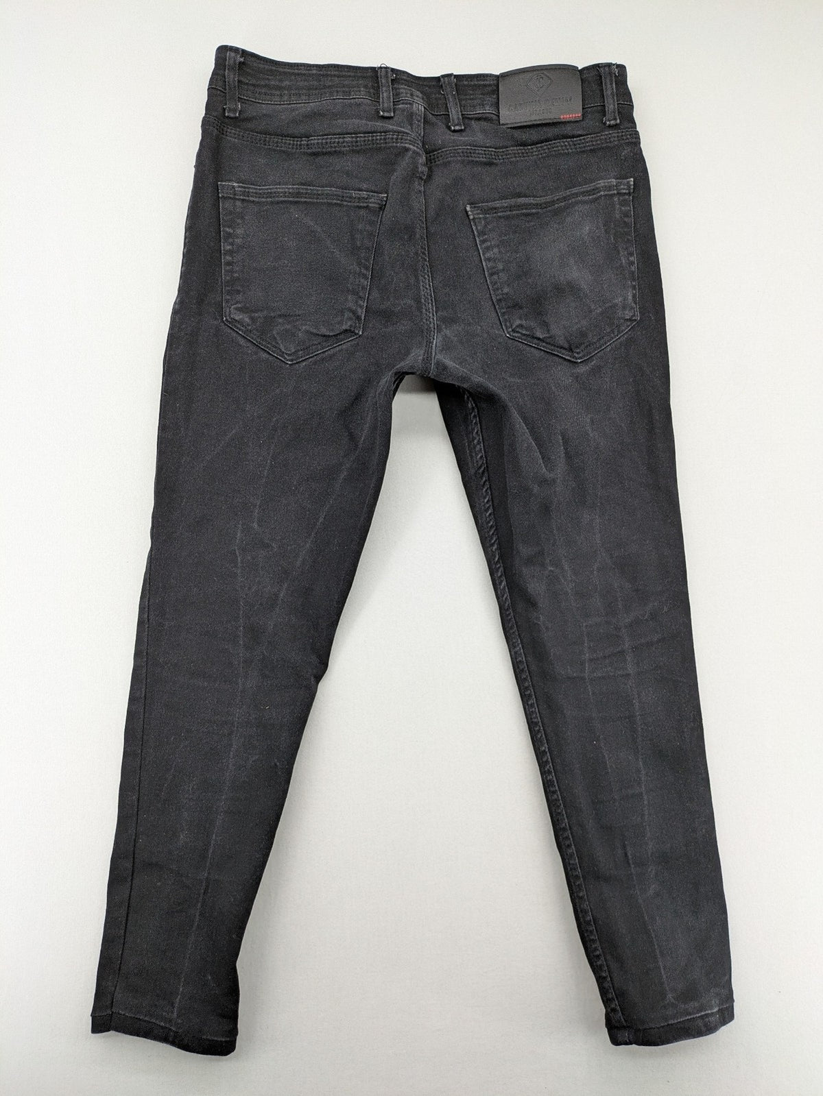 Captiva Jeans black straight jeans, classic five-pocket style, button fly, washed denim.