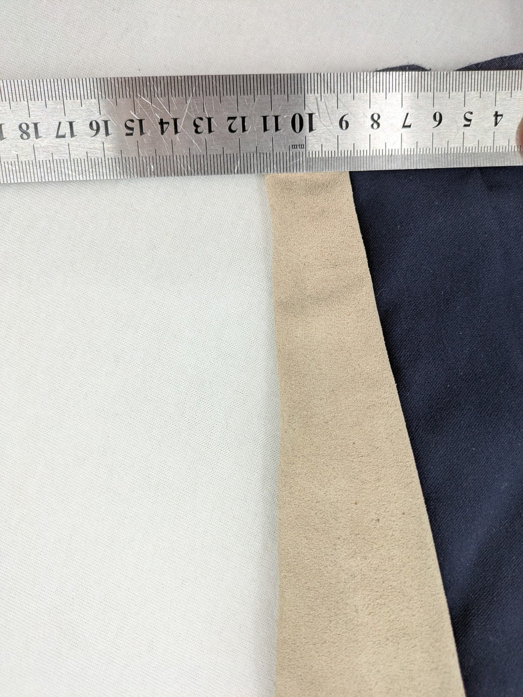 H&KM beige riding pants with dark blue full seat and front zippers.
