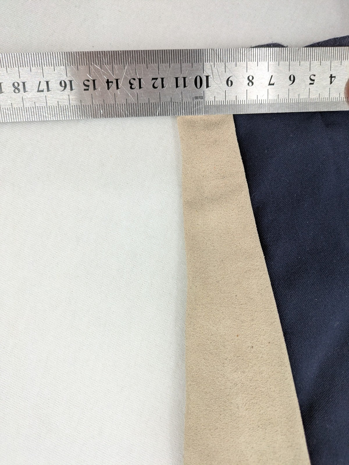 H&KM beige riding pants with dark blue full seat and front zippers.