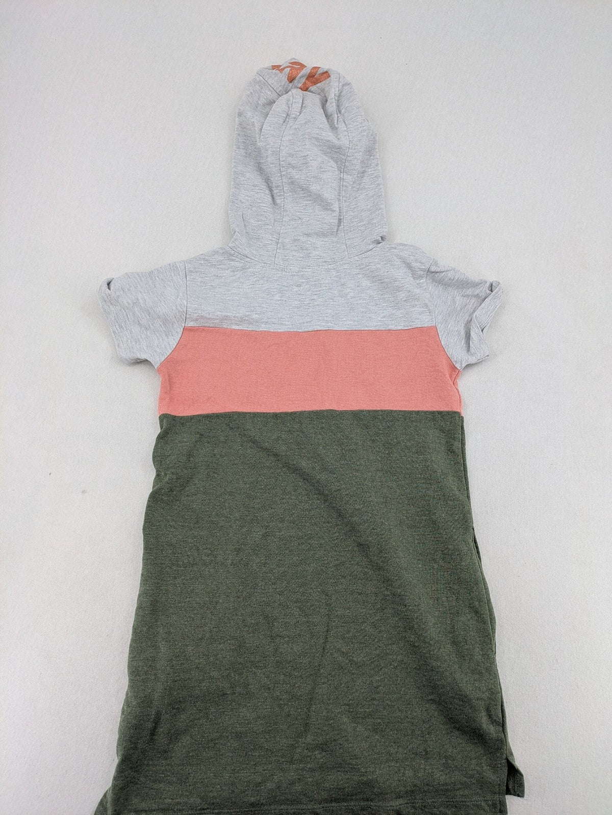 DKNY pink hoodie dress colorblock design with glitter logo and short sleeves.