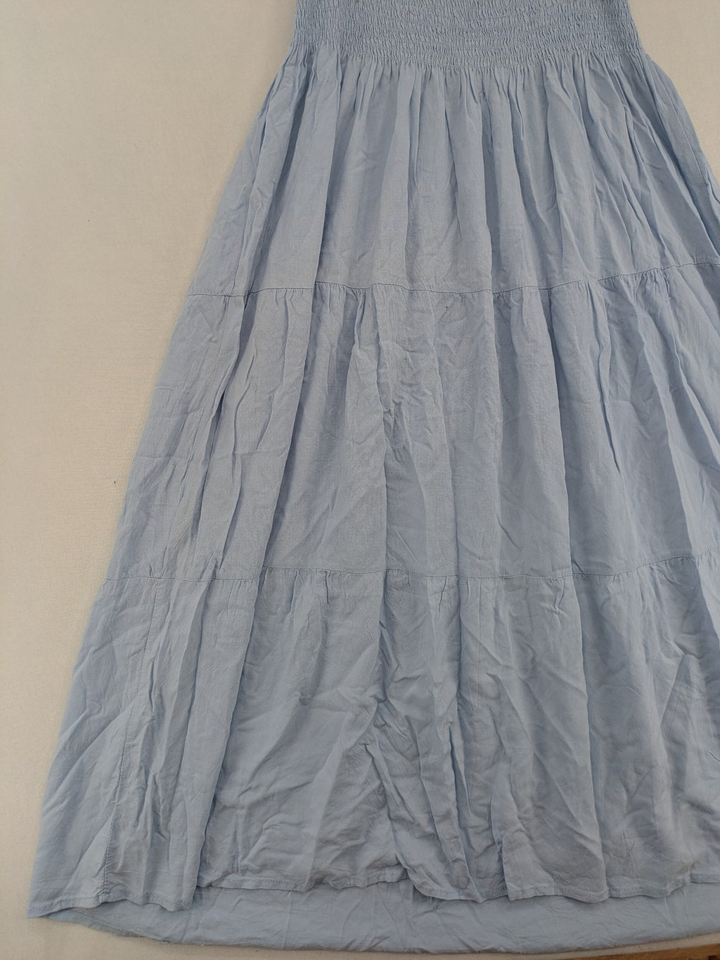 Ebelove blue summer dress with smocked bodice and adjustable spaghetti straps.