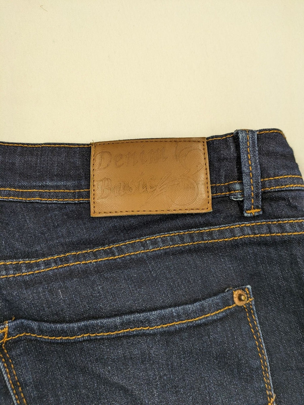 Okay blue straight jeans dark wash 5-pocket style with stretch material for comfort.