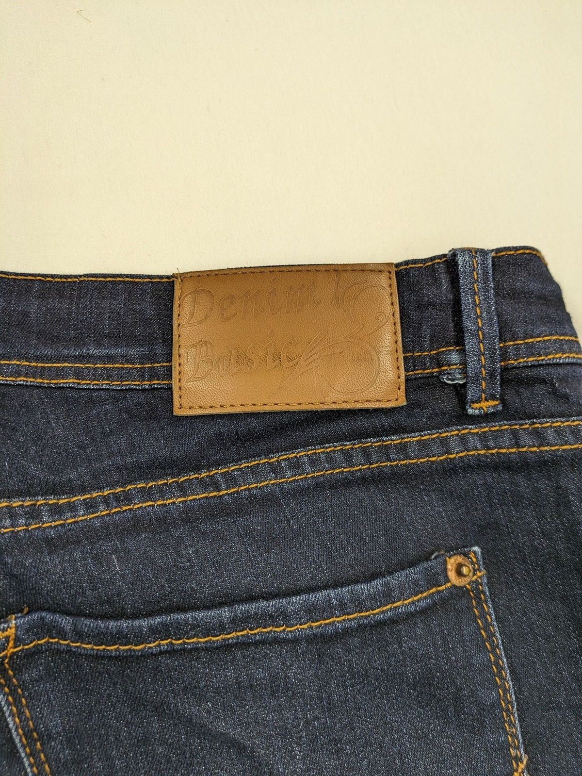 Okay blue straight jeans dark wash 5-pocket style with stretch material for comfort.