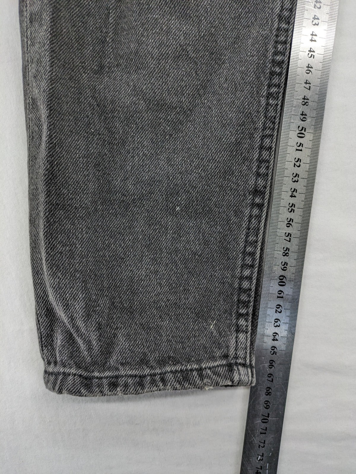 Bershka black mom jeans high-waist straight leg washed denim with classic five-pocket design.