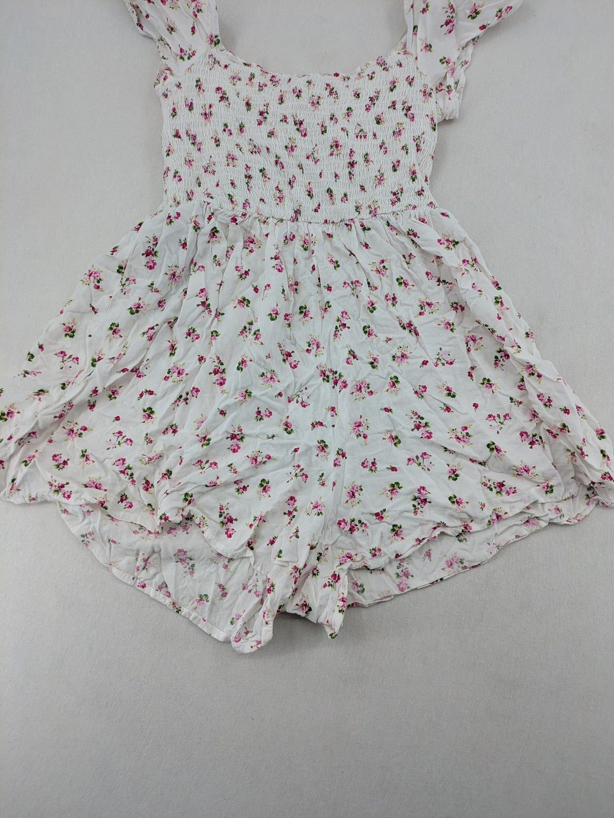 FB Sister floral playsuit white with pink flowers, smocked bodice, lightweight viscose material.