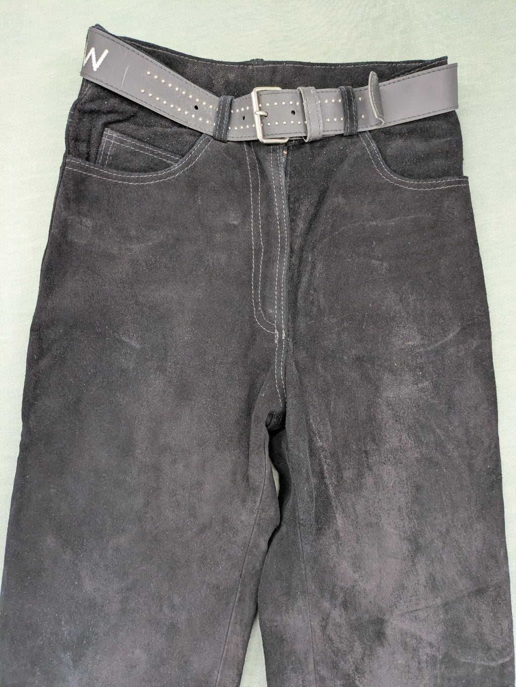 Silhouette black vintage pants high-waisted genuine suede five-pocket style with studded belt.