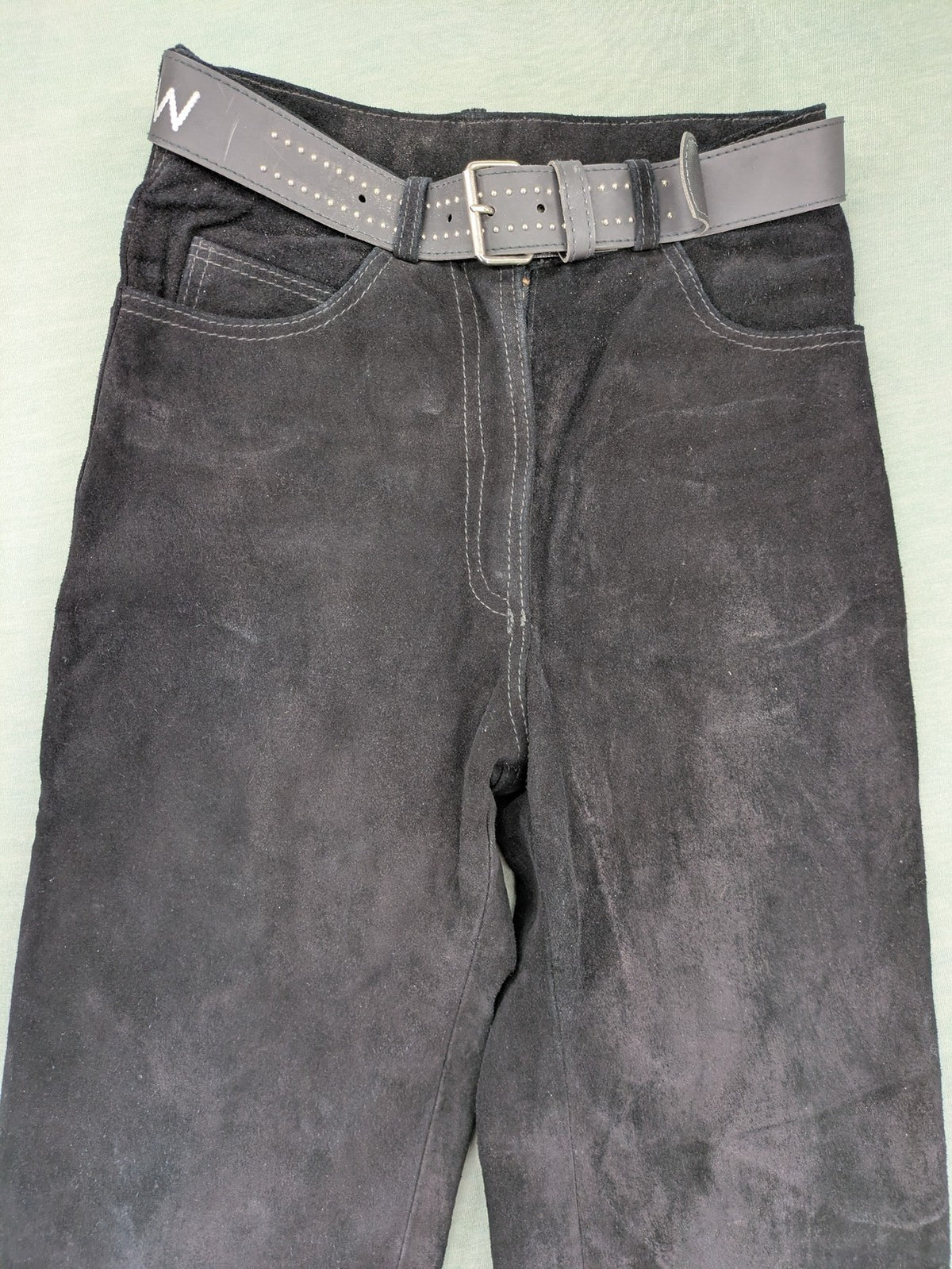 Silhouette black vintage pants high-waisted genuine suede five-pocket style with studded belt.