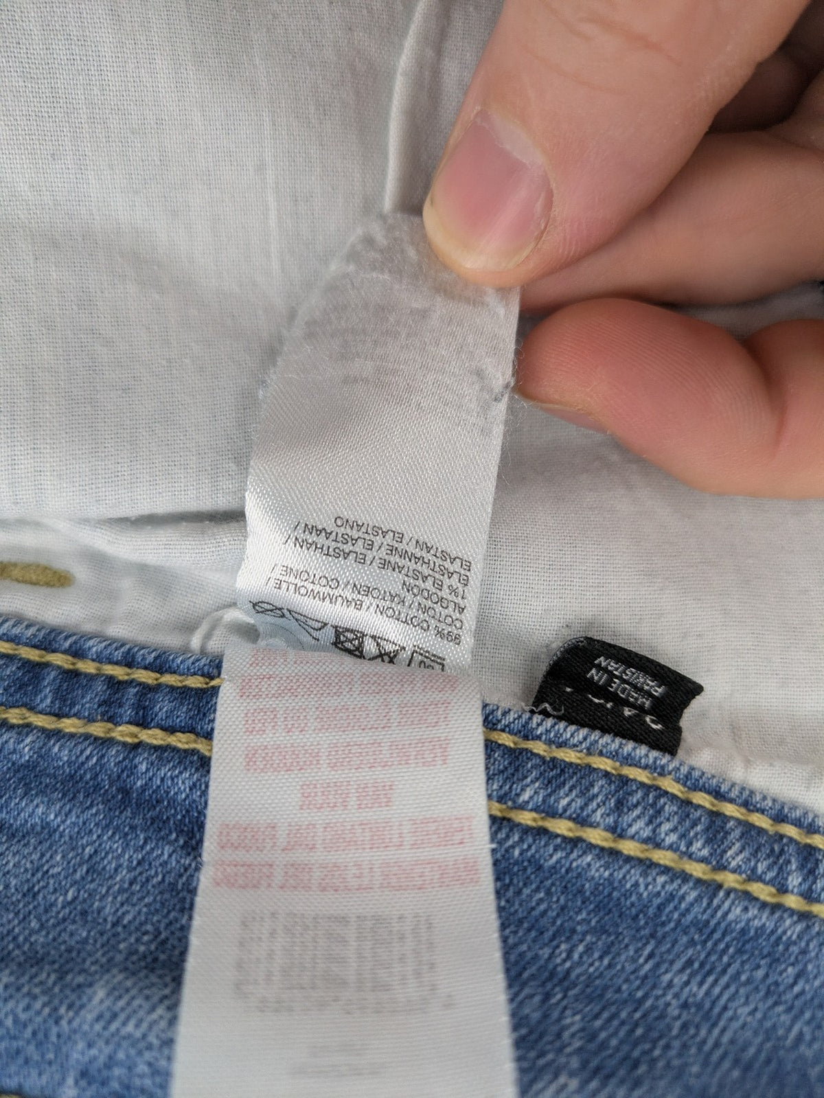 Manguun blue straight jeans with distressed wash and classic 5-pocket design.