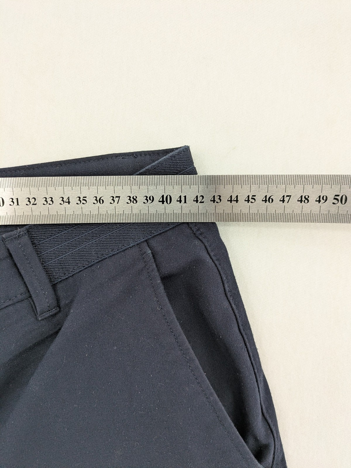 Zara navy chinos flat front design with stretch fabric for comfort and versatility.