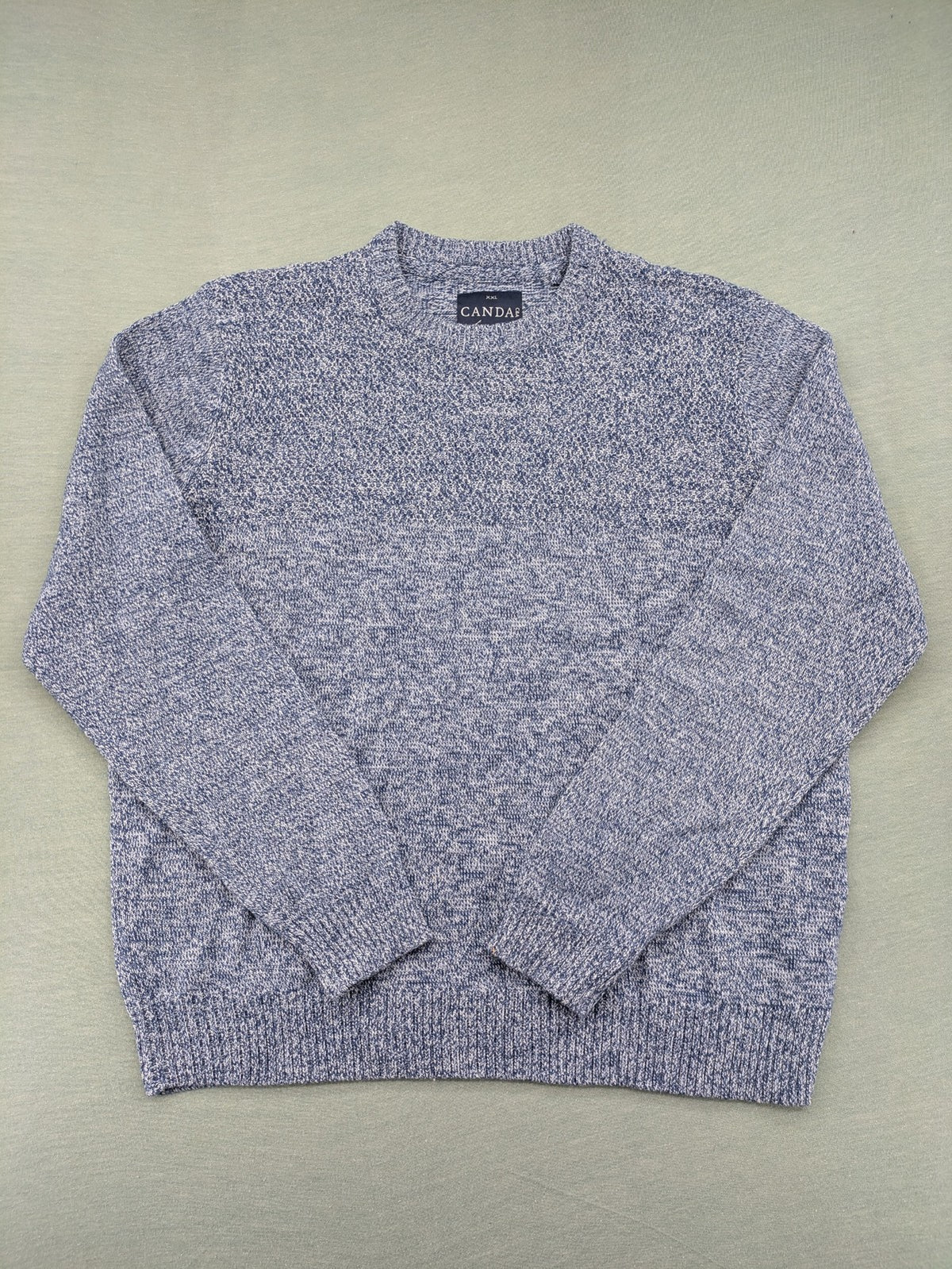 Canda blue-grey melange turtle neck jumper with long sleeves and round neckline.