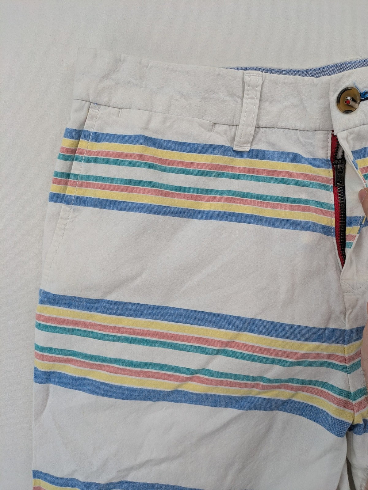 Tommy Hilfiger chino shorts blue and green striped pattern with iconic flag logo.