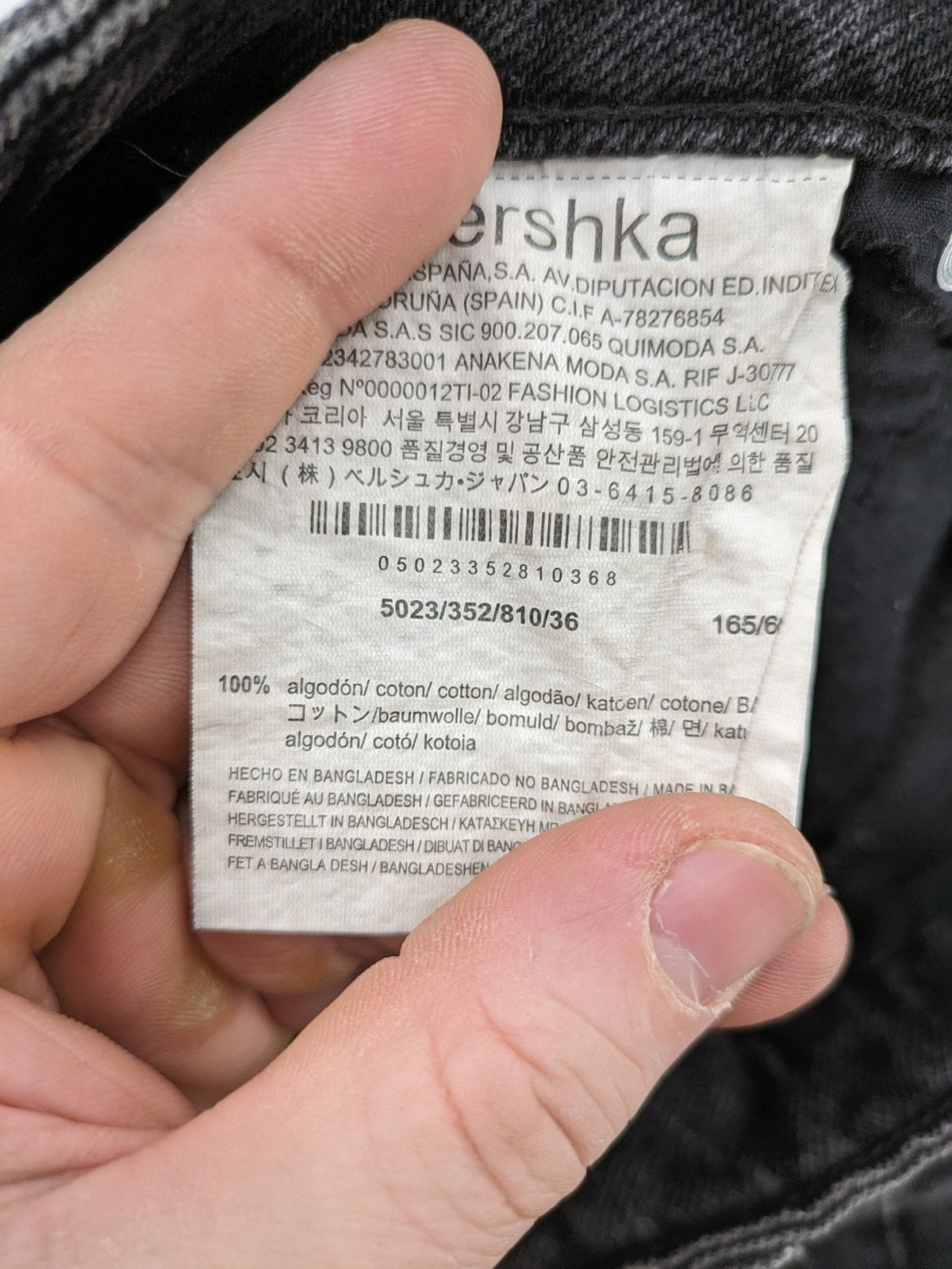 Bershka black mom jeans high-waist straight leg washed denim with classic five-pocket design.