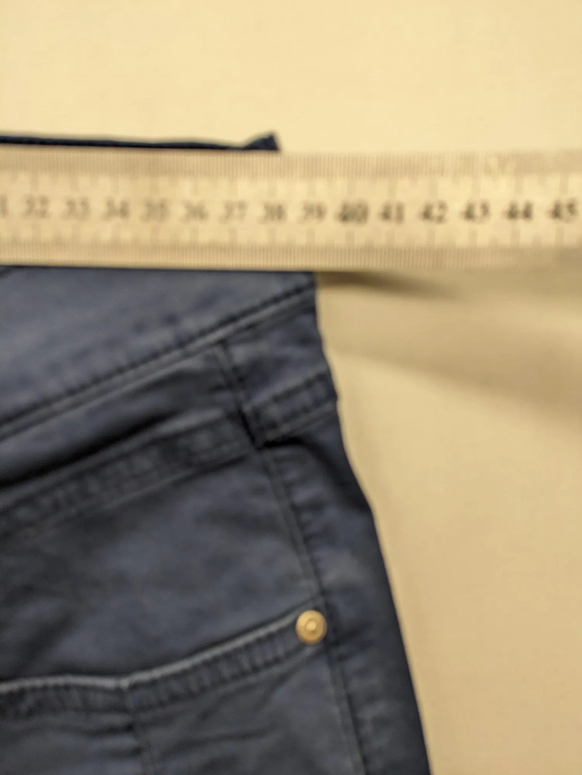 Angels blue straight jeans with five-pocket design and vertical front seams.