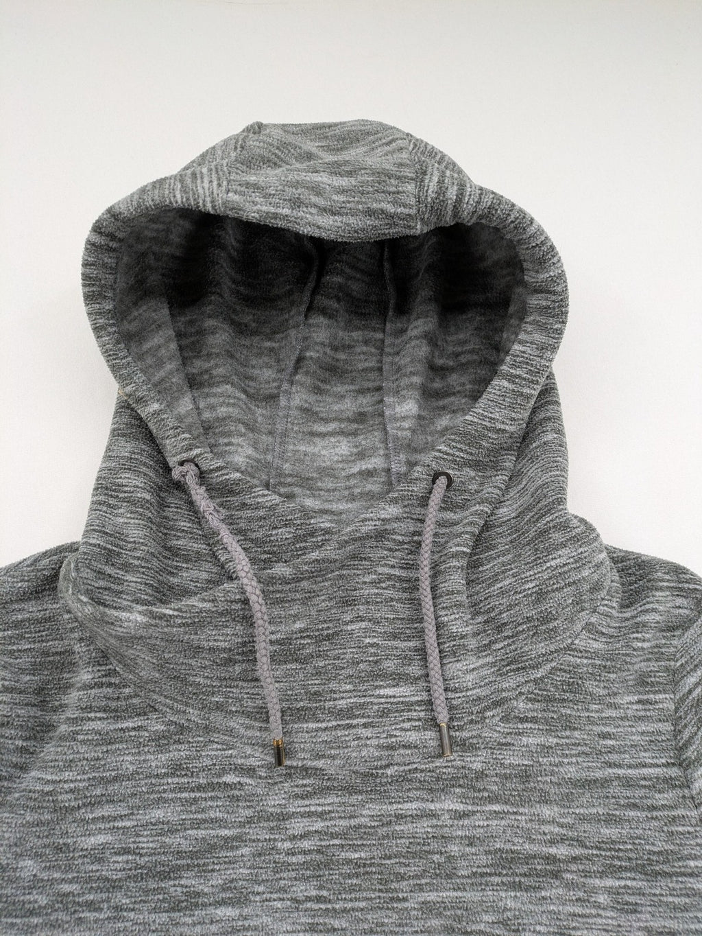 Crane grey fleece turtle neck jumper with adjustable drawstring hood and melange fabric.
