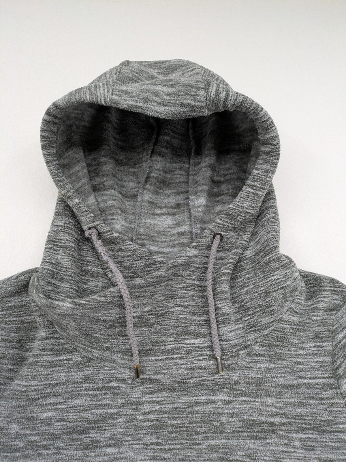 Crane grey fleece turtle neck jumper with adjustable drawstring hood and melange fabric.