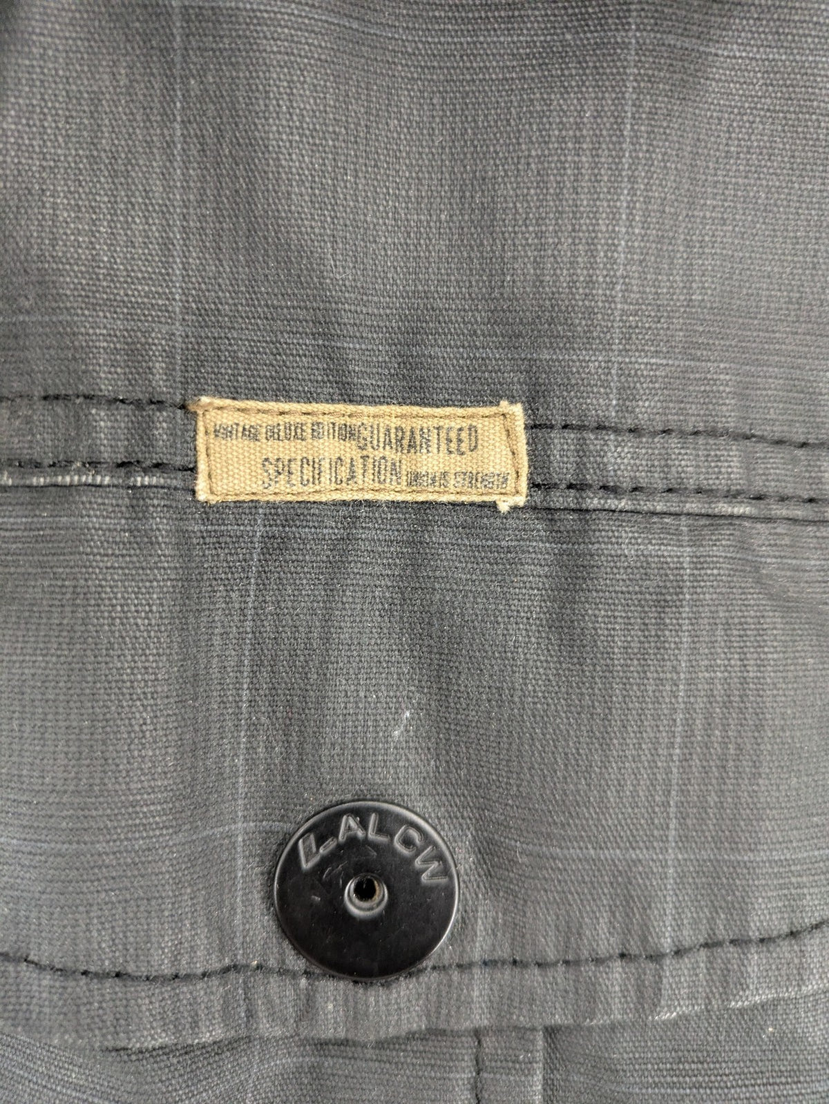 Angelo Litrico grey pilot jacket with removable hood, zip closure, and multiple pockets.