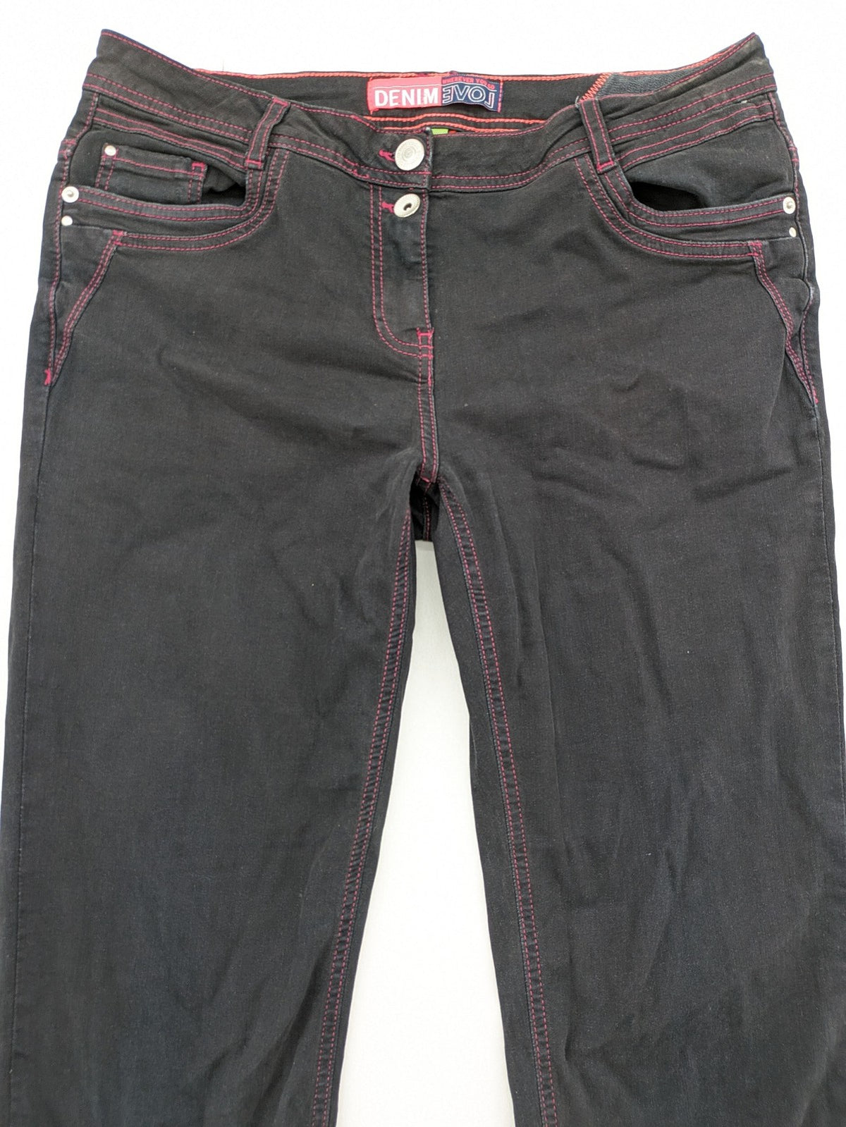 Denim black straight jeans with pink contrast stitching and classic 5-pocket style.