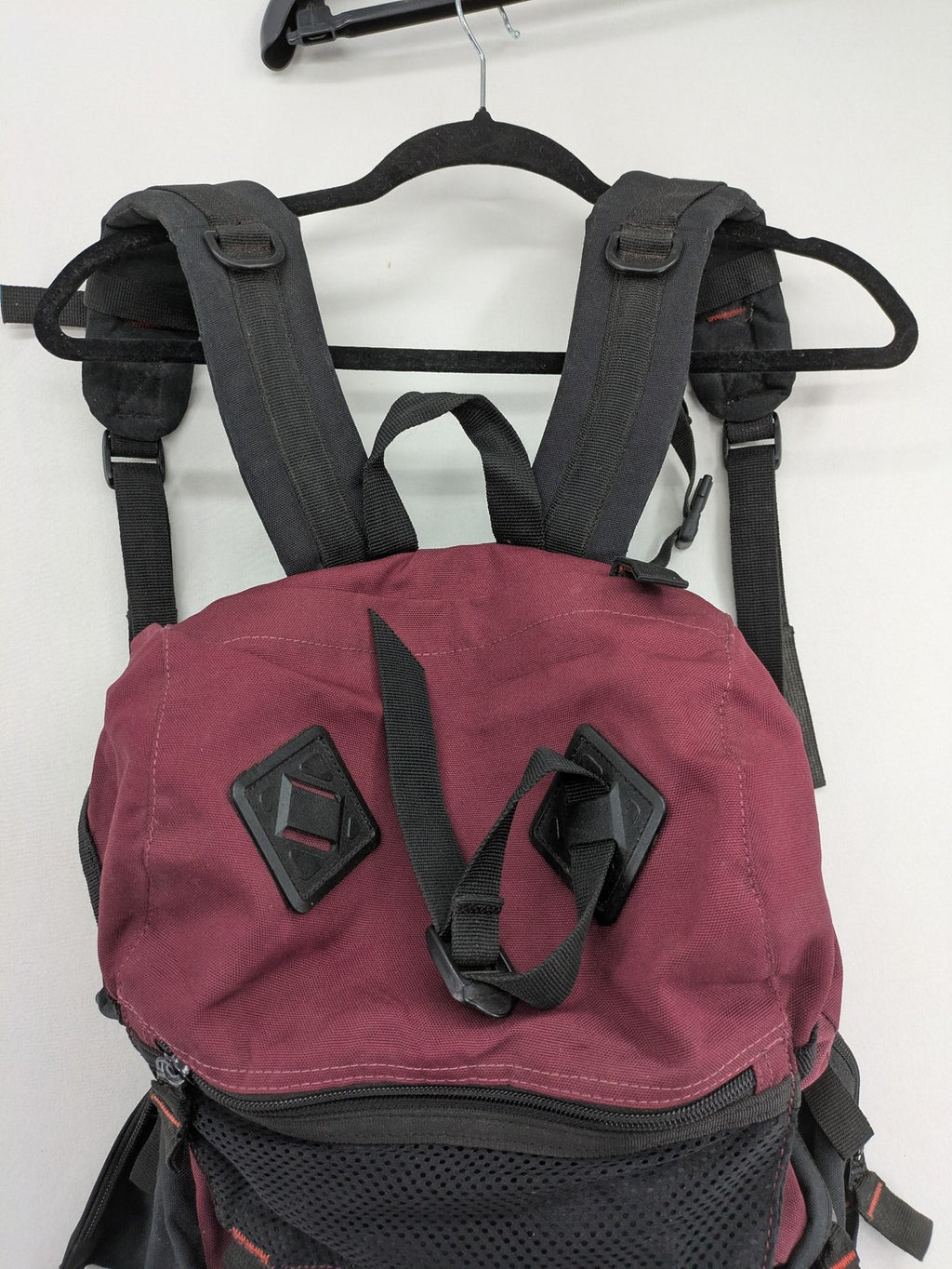 Adidas burgundy vintage rucksack with logo, Teflon fabric, and drawstring closure.