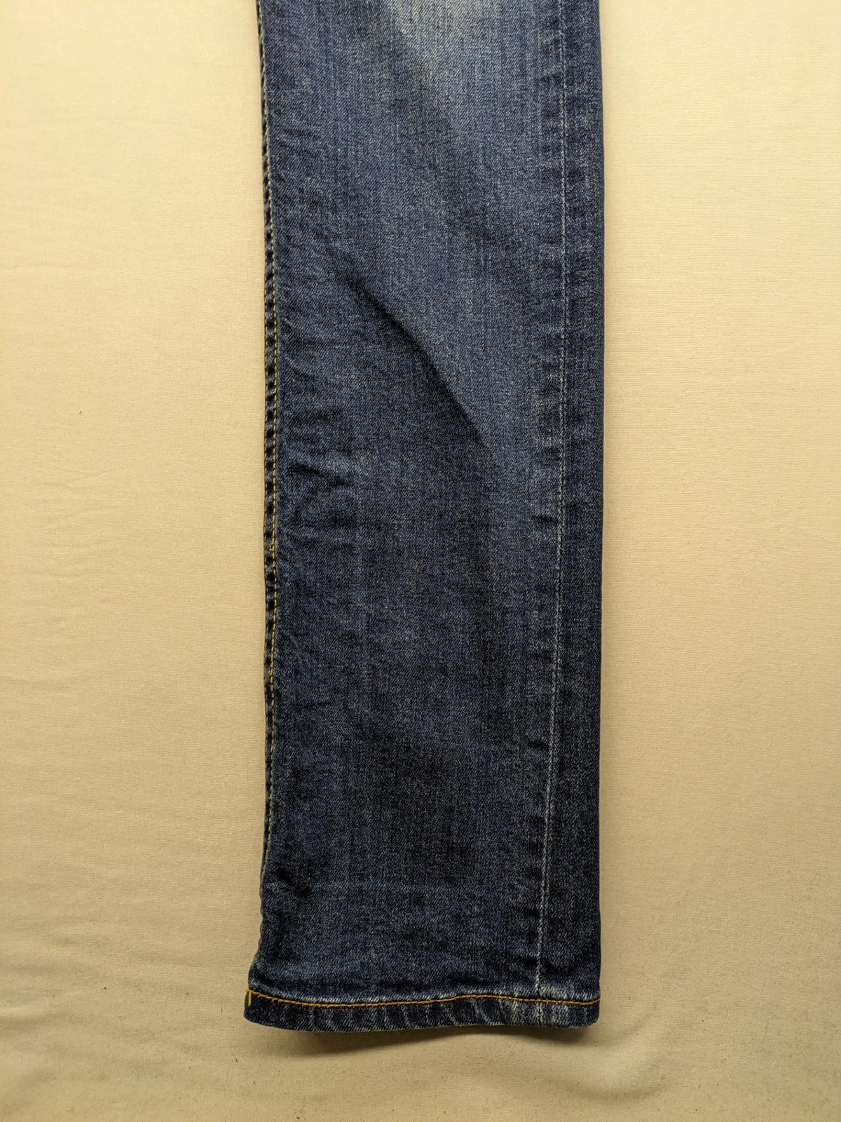 Vingino blue straight jeans medium wash 5-pocket design with zipper fly and stretch denim.