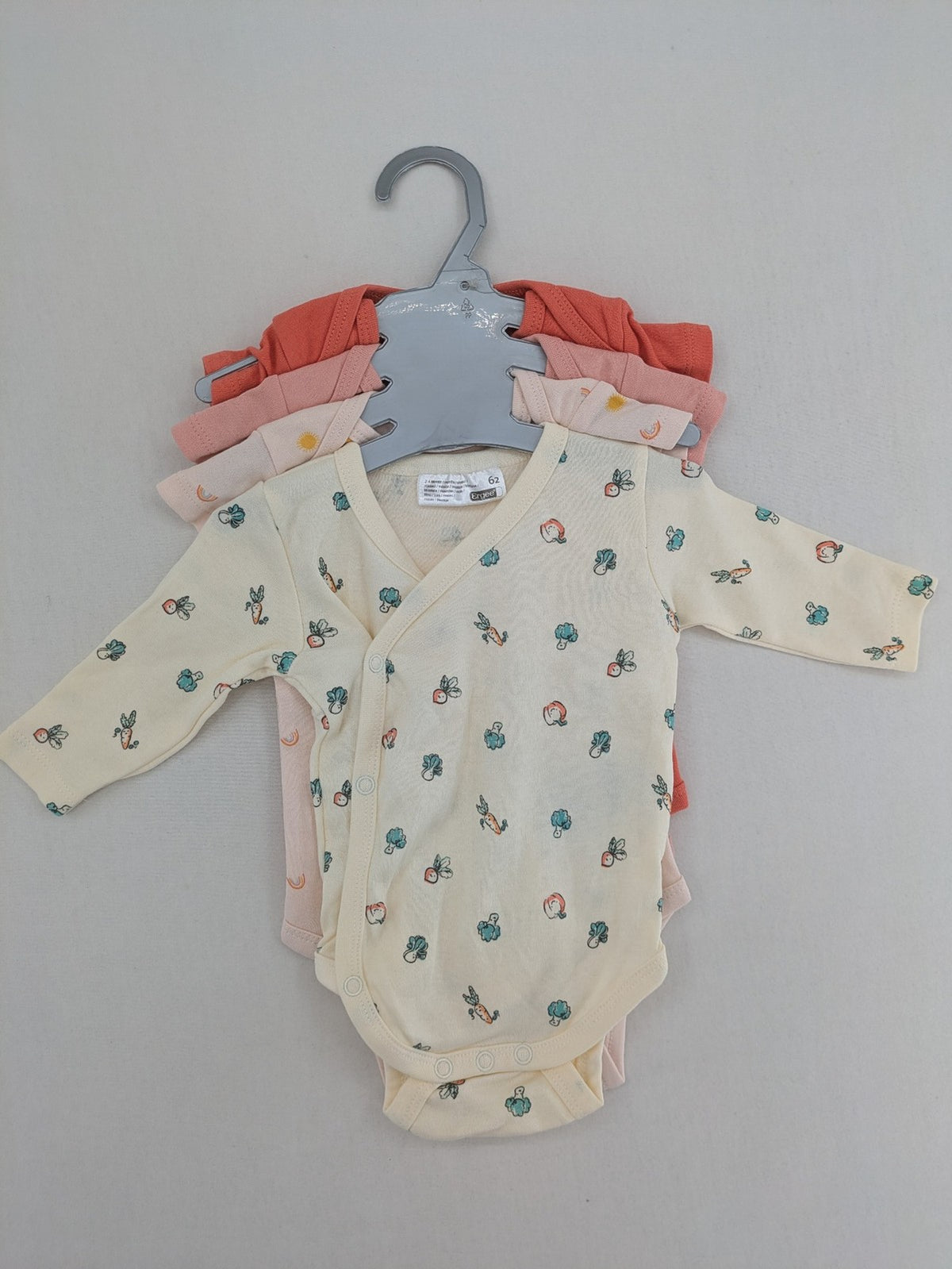 Ergee baby bodysuits set blue cream orange various cute patterns and wrap design.