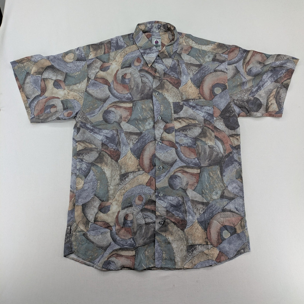 Club D'Amingo short sleeve shirt multi abstract geometric pattern in earthy tones.