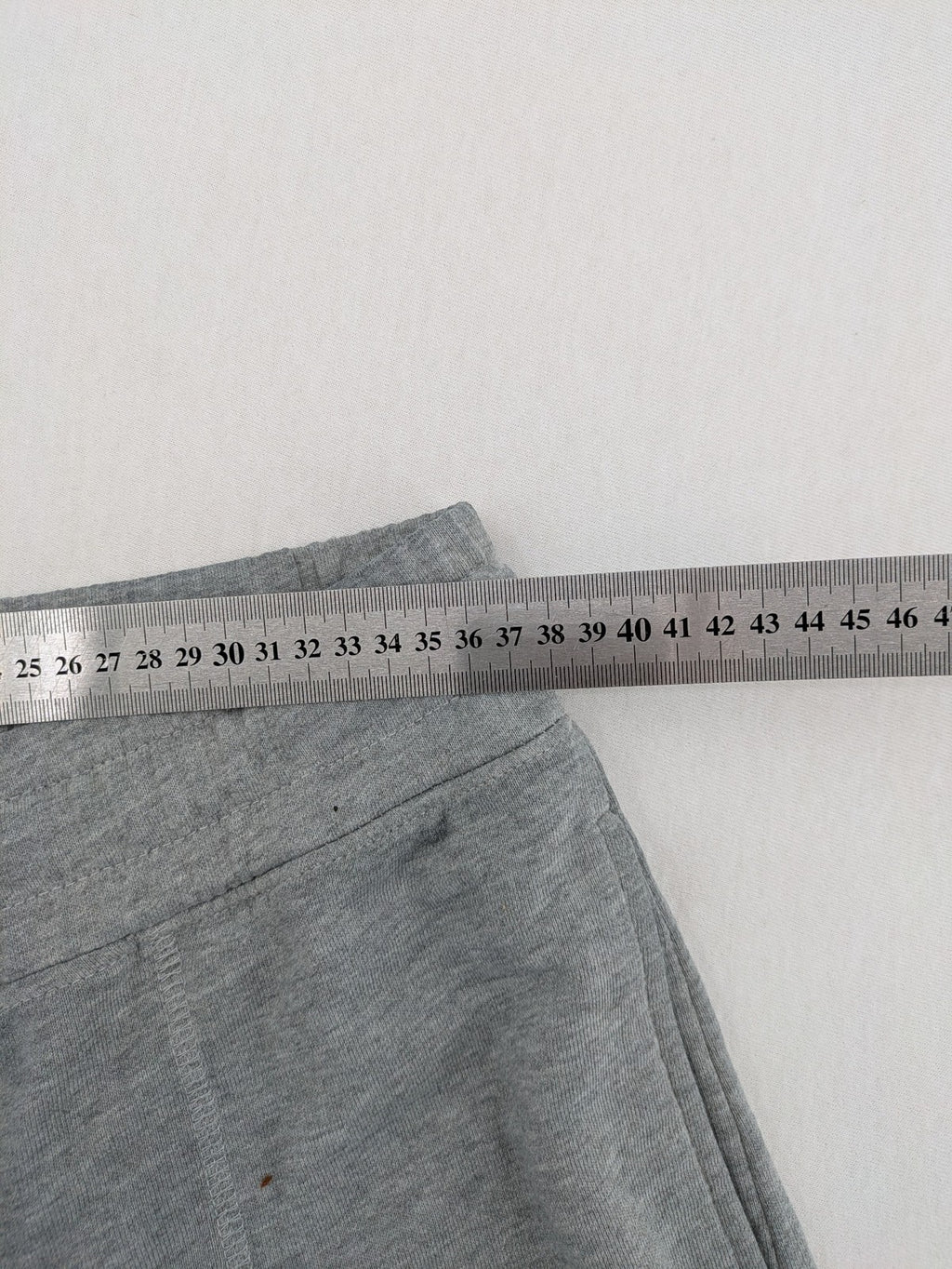 Private Baller grey sweatpants with "32" graphic print and blue drawstring.