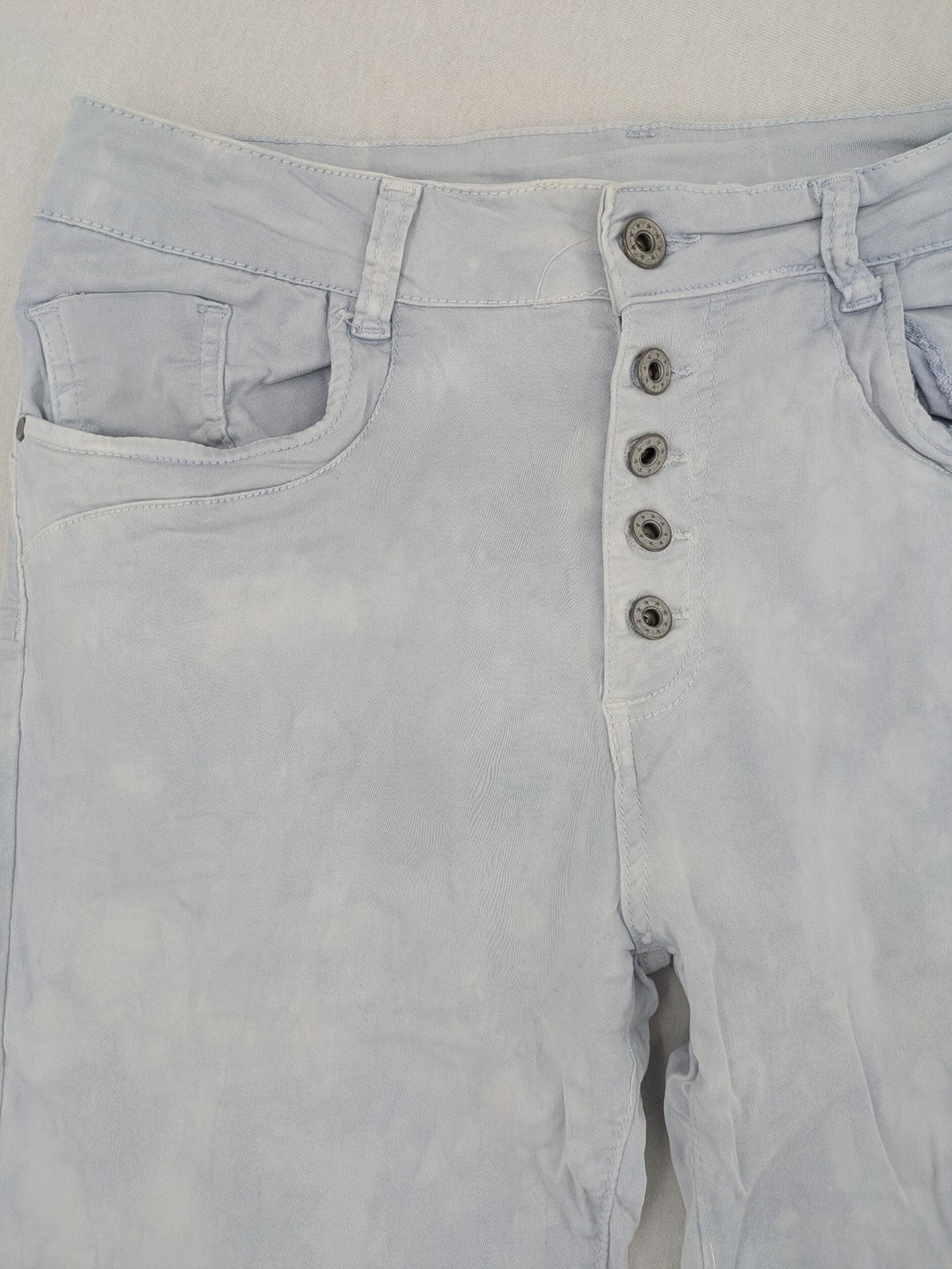 Yelly&Co blue and white batik pants with button fly, made from soft stretch fabric.