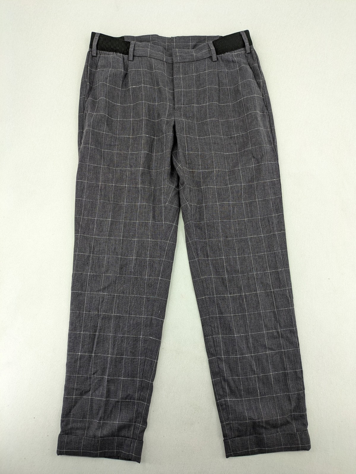 MNG Man grey plaid pants with rolled hem and stretch performance material.