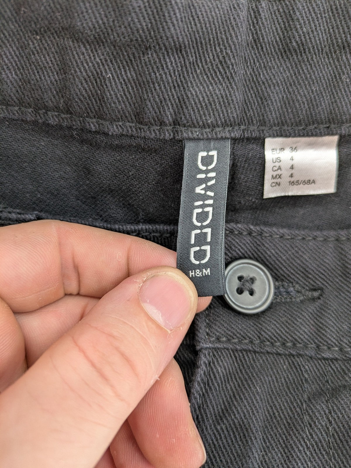 H&M Divided black cargo pants high waist cotton with multiple pockets and straight leg.