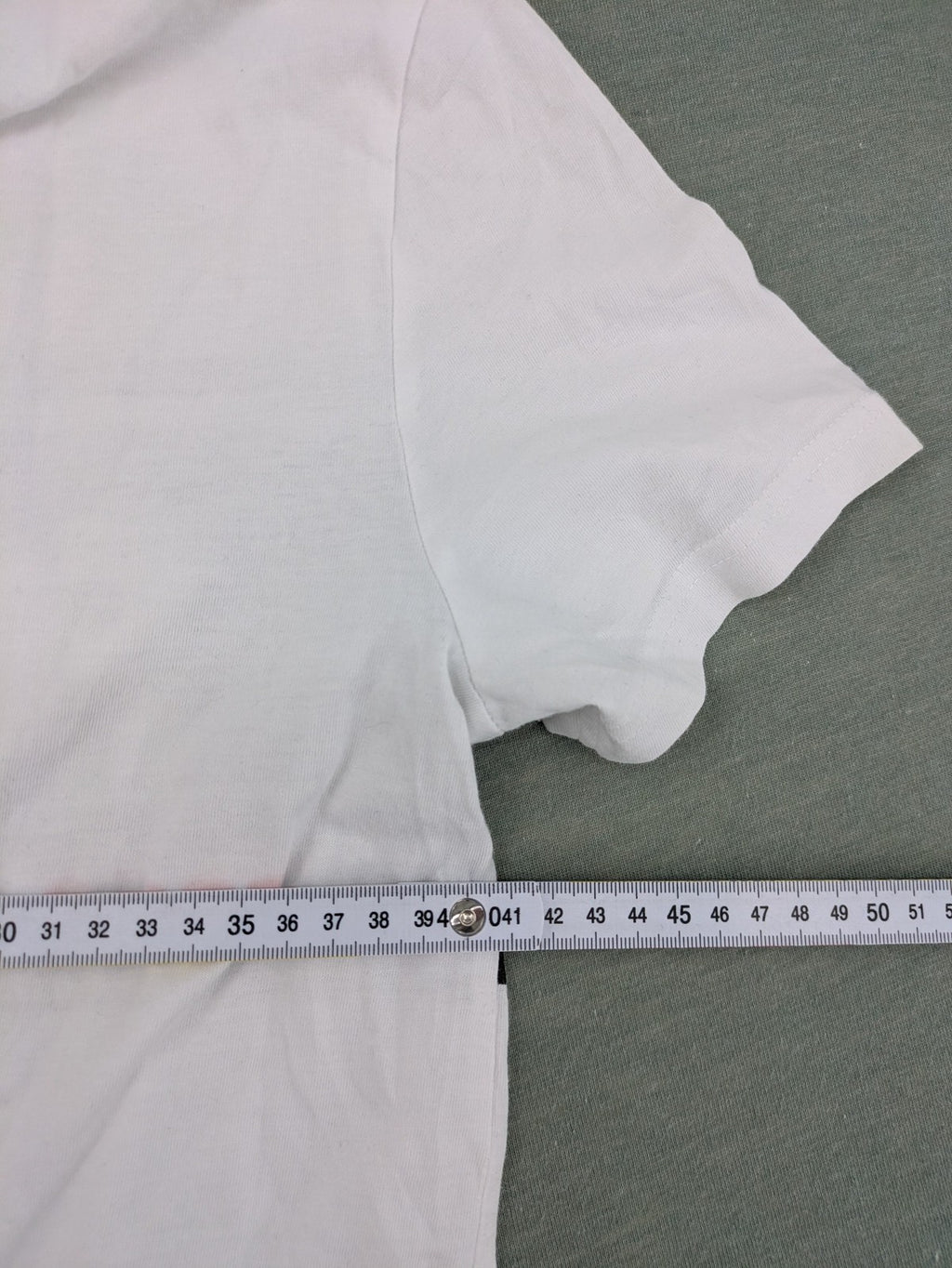 Fortnite white t-shirt with black chest stripe and Epic Games logo, 100% cotton.