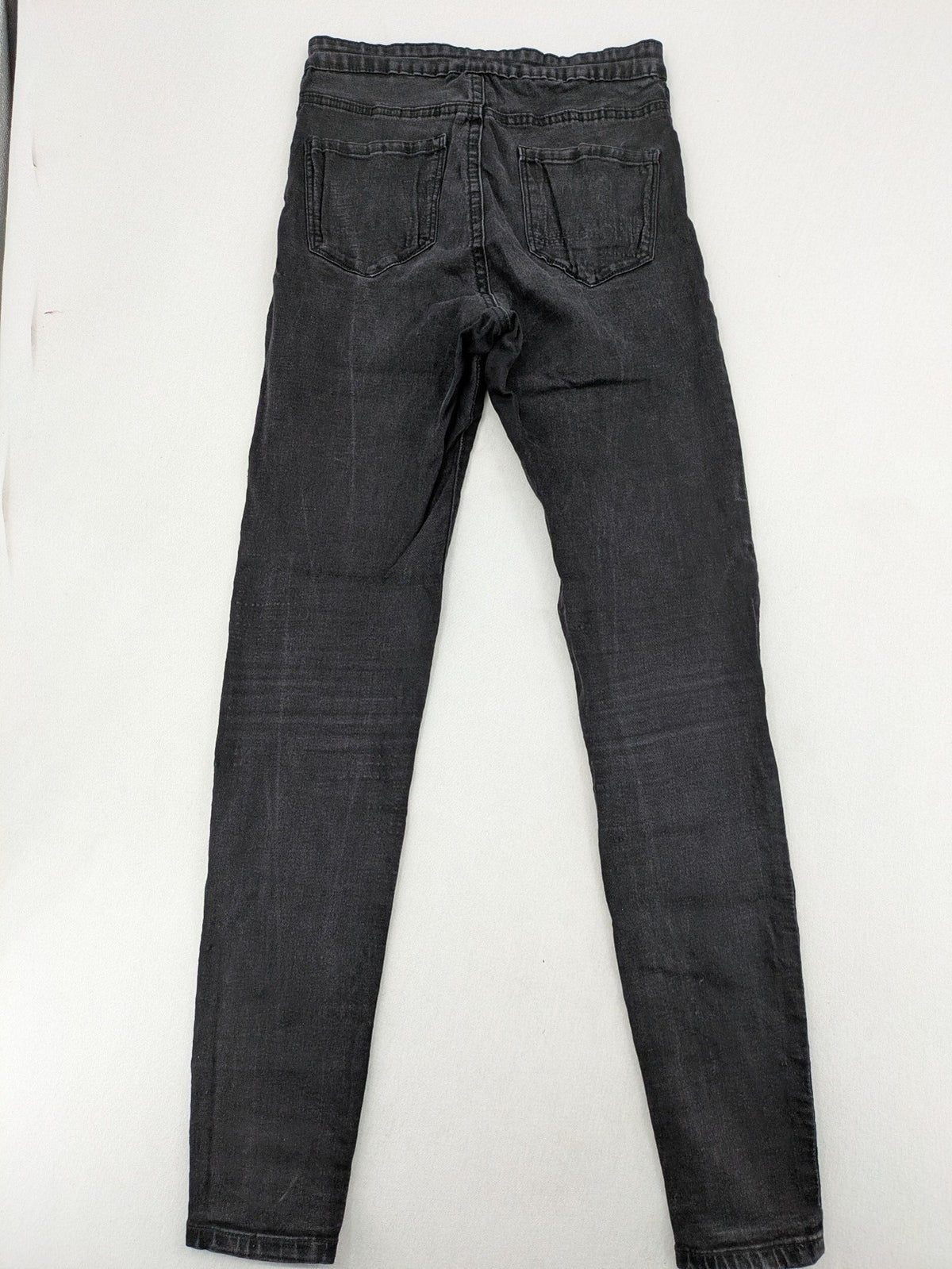 Denim & Co. black skinny jeans high waist stretch denim with washed finish.