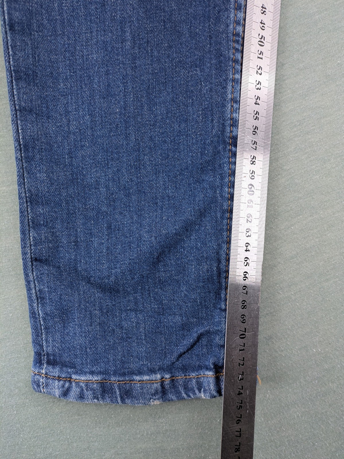 Zara blue straight jeans with medium wash, lightweight denim, and regular fit.