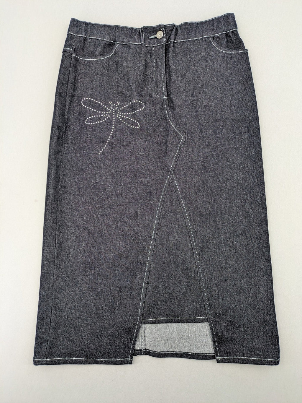 Extyn blue midi skirt with rhinestone dragonfly detail and front slit, stretchy denim fabric.