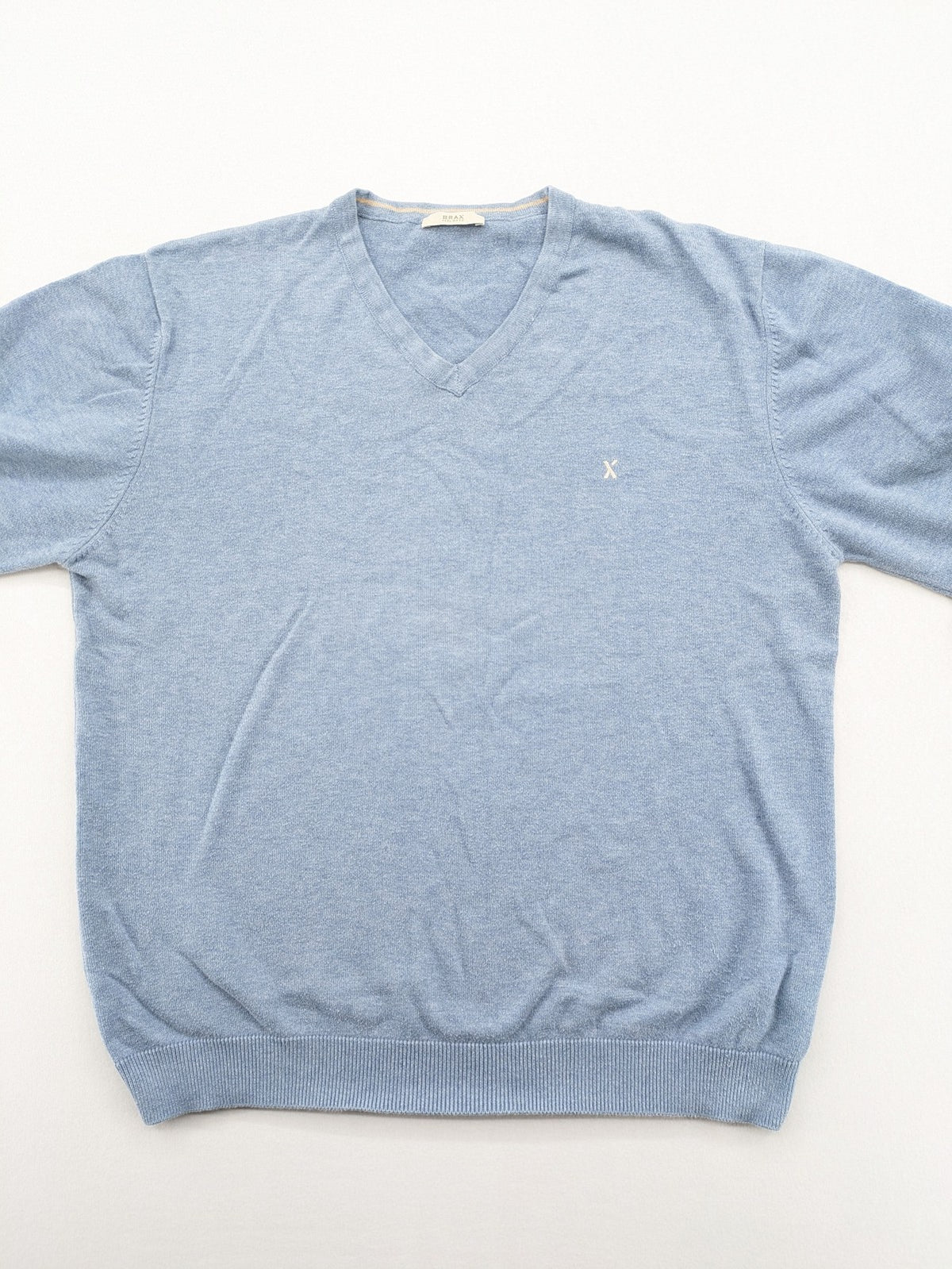 BRAX blue turtle neck jumper with V-neck and subtle "X" logo embroidery.
